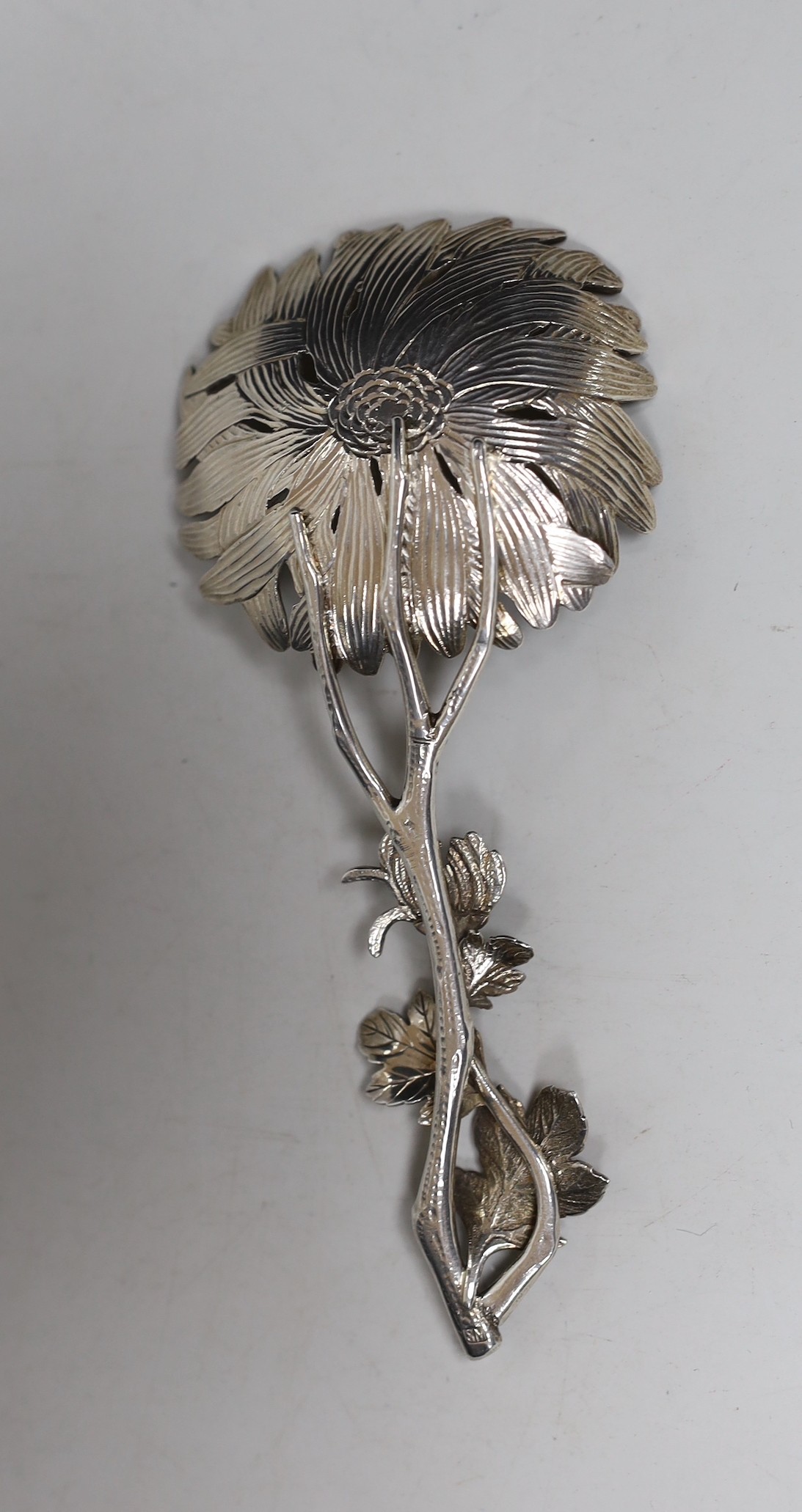 A Chinese? white metal spoon, modelled as a stemmed flower, maker's mark WS, 12.6cm, 46 grams